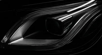 Gros plan minimaliste d'un phare de voiture de sport, design iconique