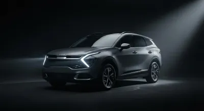 Vue rapprochée des phares et de la calandre du Kia Sportage Business